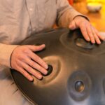 Close-Up Shot of a Person Using a Handpan