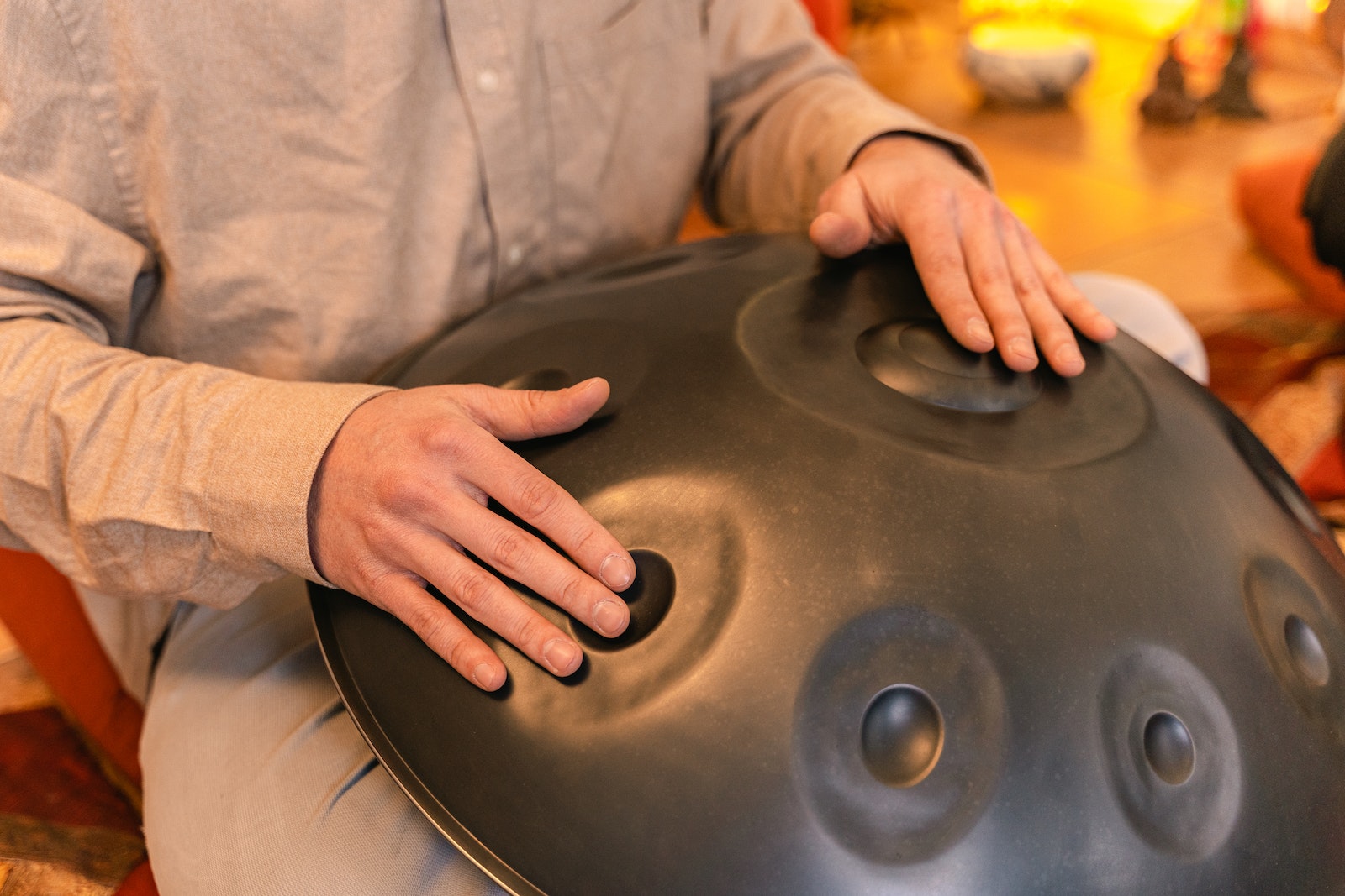 Close-Up Shot of a Person Using a Handpan