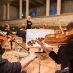 orchestra playing their piece