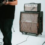 guitar amplifier near drum instrument